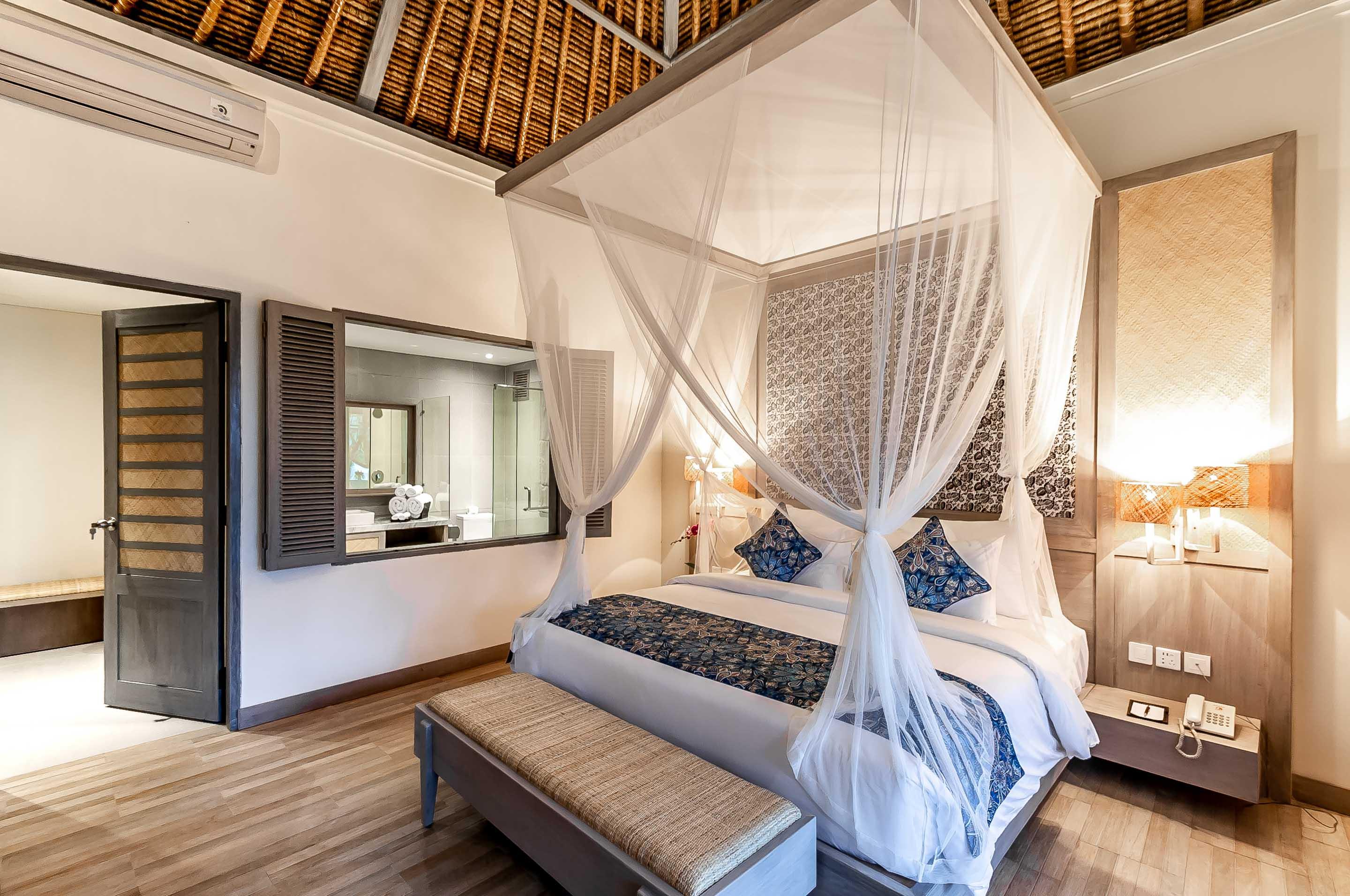 Nirwana Beach & Resort Candidasa Exterior foto A bedroom at the resort