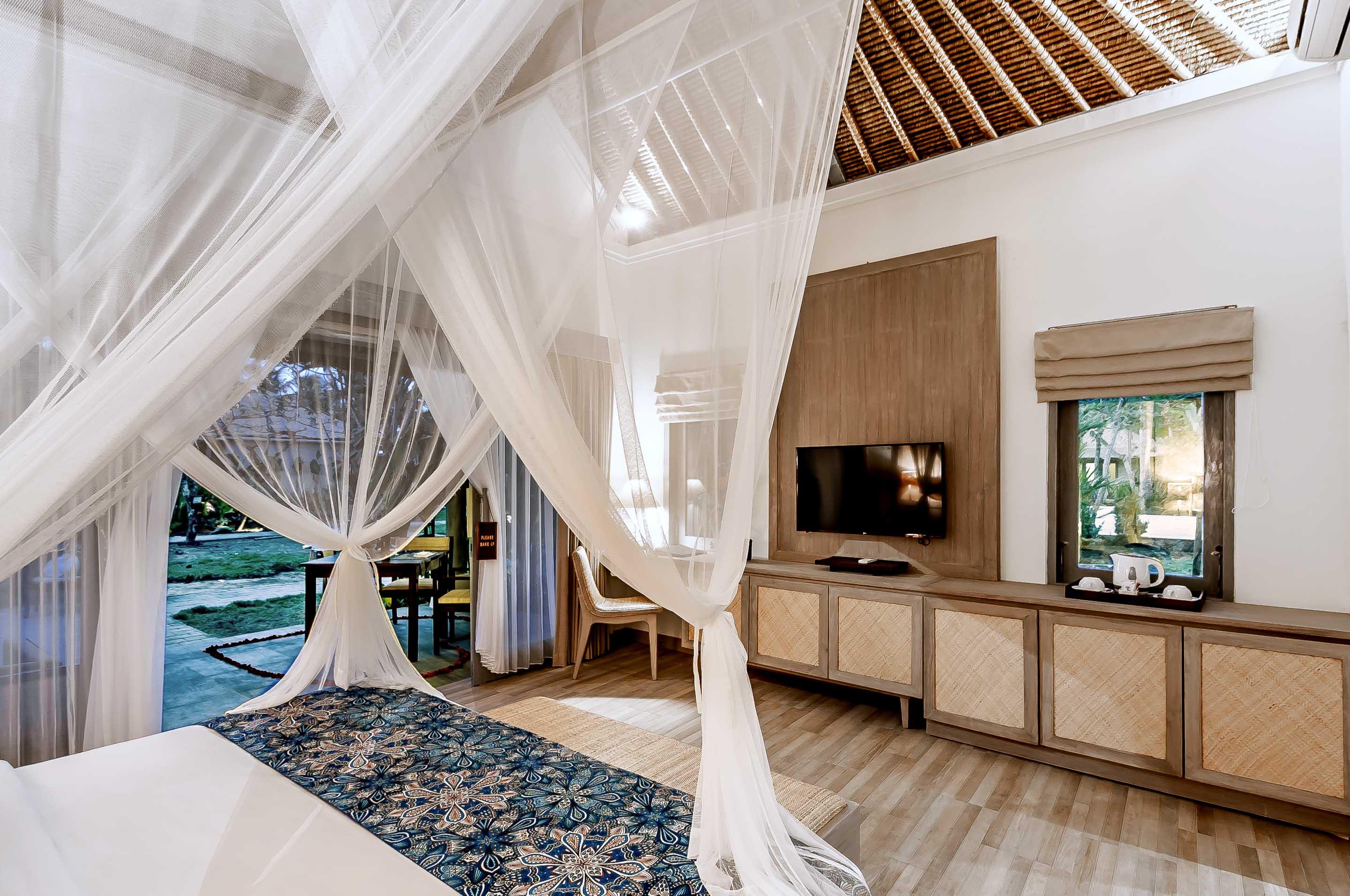 Nirwana Beach & Resort Candidasa Exterior foto A bedroom at the resort