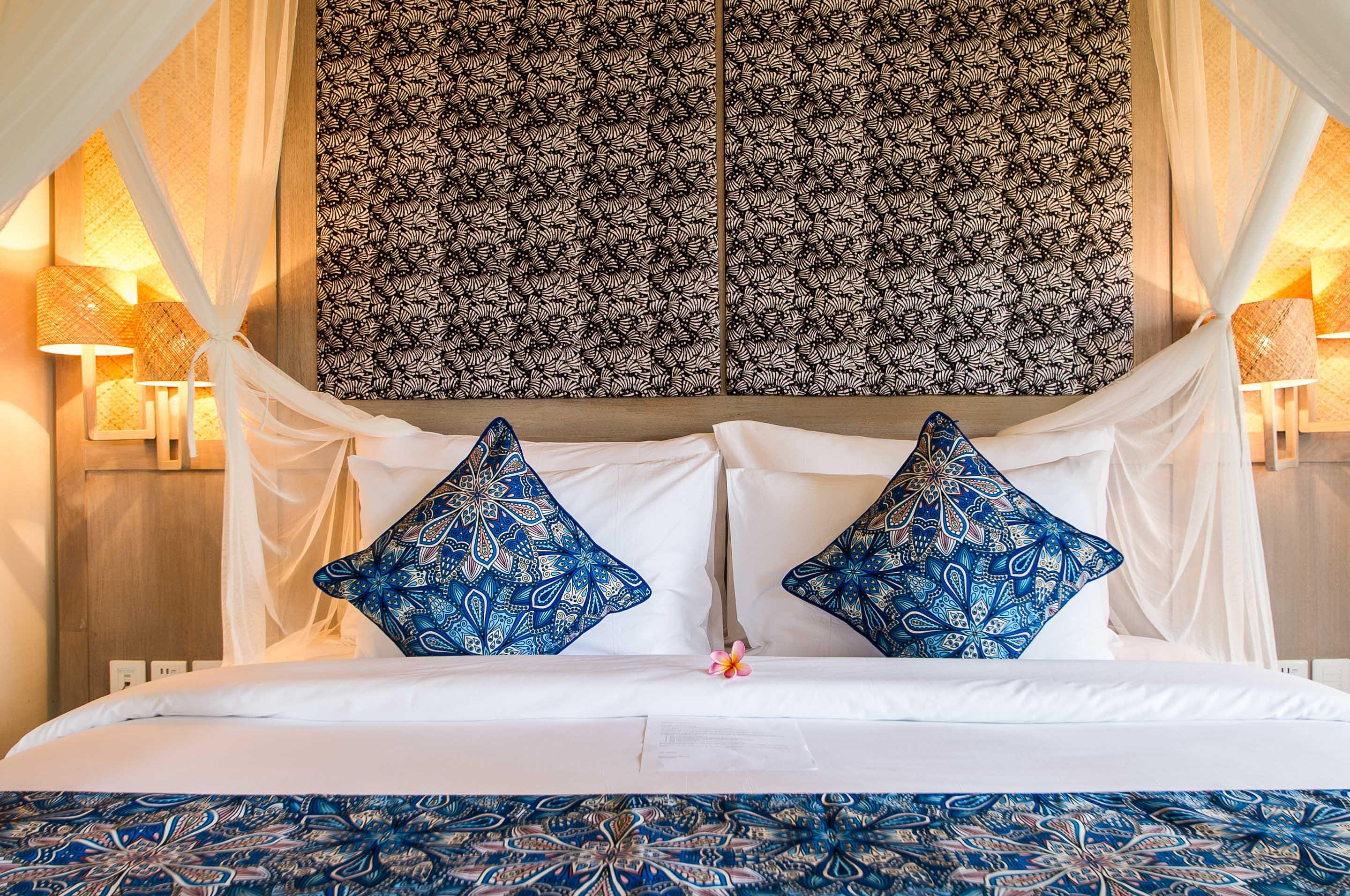 Nirwana Beach & Resort Candidasa Exterior foto A bed with a mosquito net