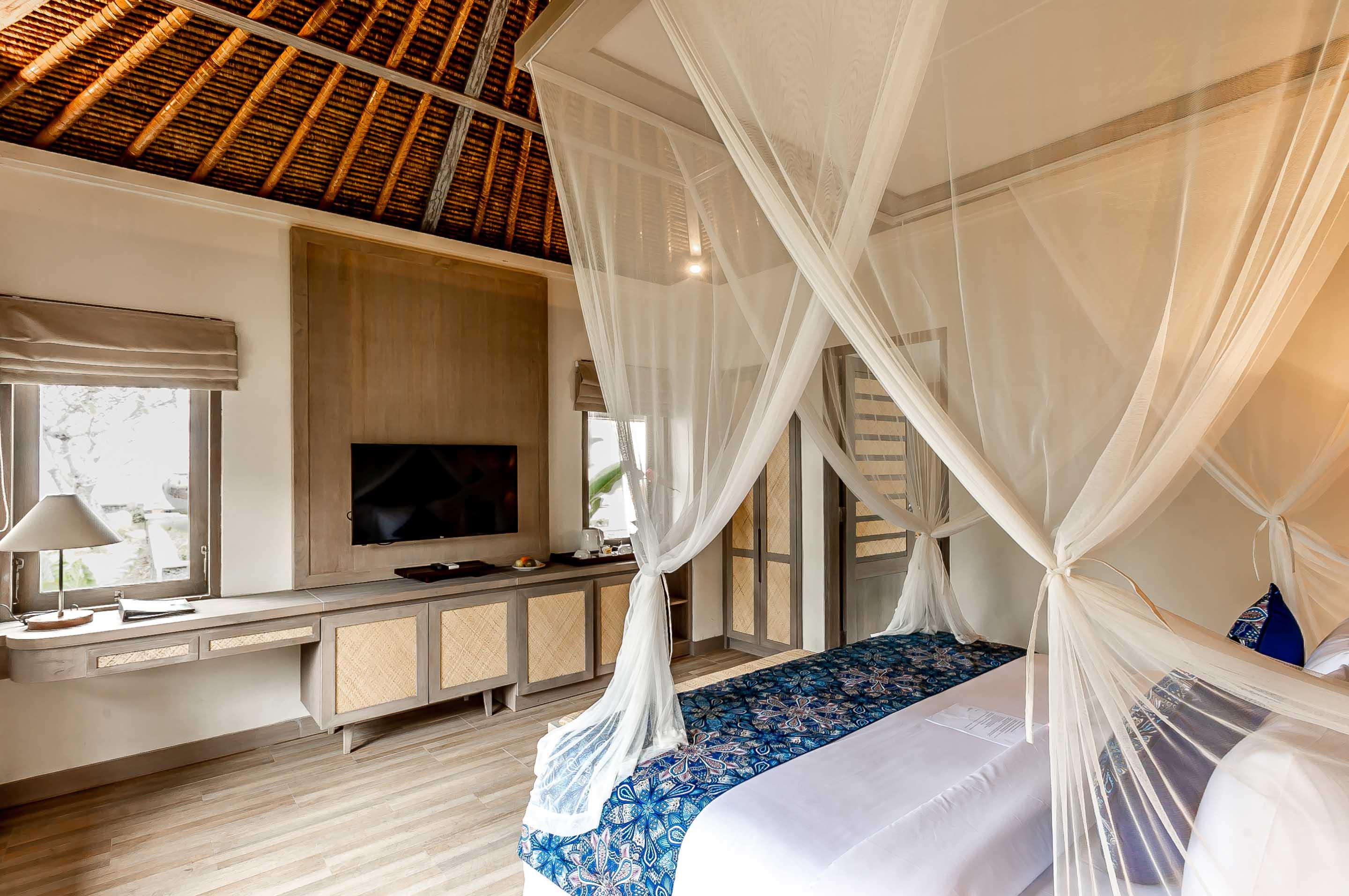 Nirwana Beach & Resort Candidasa Exterior foto A bedroom at the resort