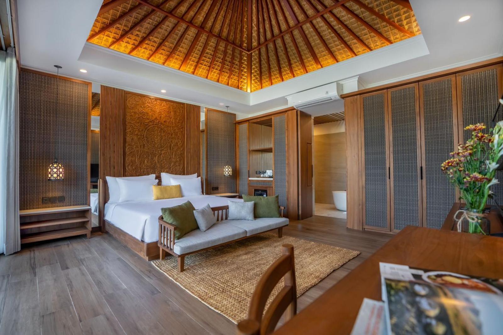 Nirwana Beach & Resort Candidasa Exterior foto A bedroom at the resort