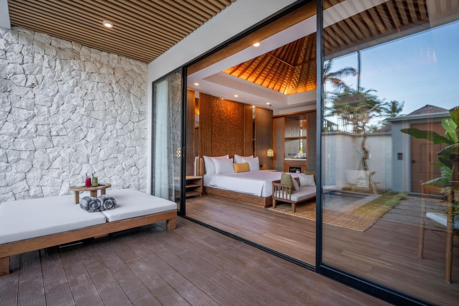 Nirwana Beach & Resort Candidasa Exterior foto A bedroom at the resort