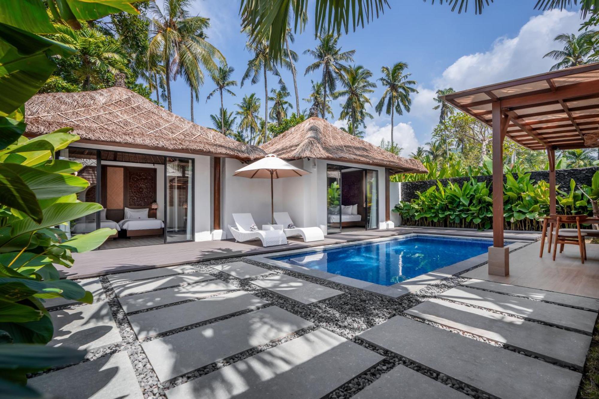 Nirwana Beach & Resort Candidasa Exterior foto A villa at the resort